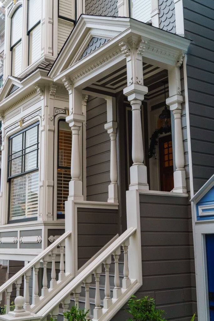 Elegant Victorian architecture with intricate detailing on a classic porch.
